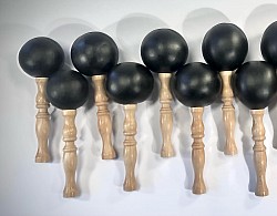 Maracas made out of gourd and handles on beech wood, filled with natural or synthetic seeds.