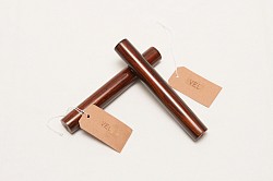 If you buy a rain gourd this, you will receive a pair of claves made out of granadilla for free :-)